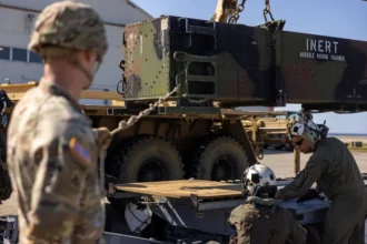 U.S. Marines and Army personnel handle a PAC-3 training canister. Tungsten components from domestic suppliers like The Elmet Group provide foundational materials for PAC-3 missile production. (Photo: Lance Cpl. Sav Ford / U.S. Marine Corps / DVIDS)
