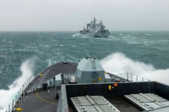 A Royal Fleet Auxiliary tide-class replenishment tanker conducts replenishment at sea operations. (Photo: UK Ministry of Defence)